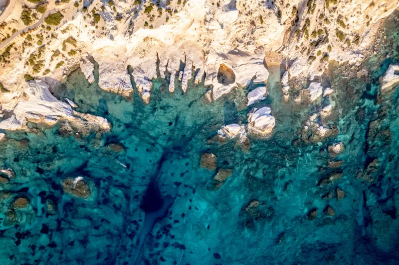 Aerial view of the Paphos coastline and sea caves in Cyprus