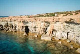 The white sea caves at the waterline